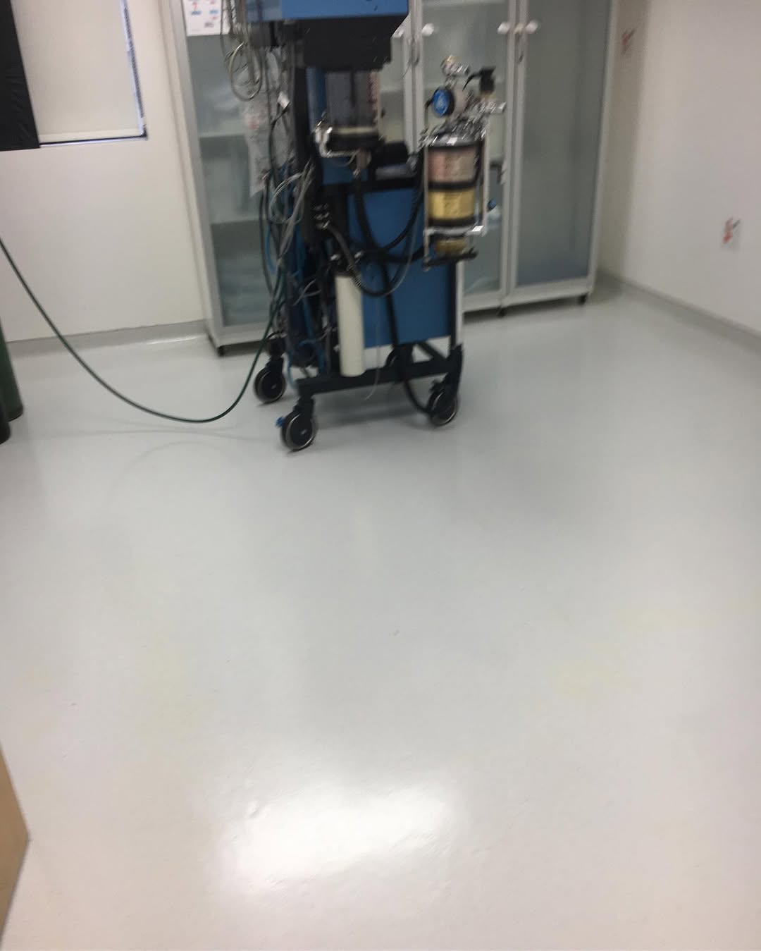 Specialty lab floor cleaned around equipment