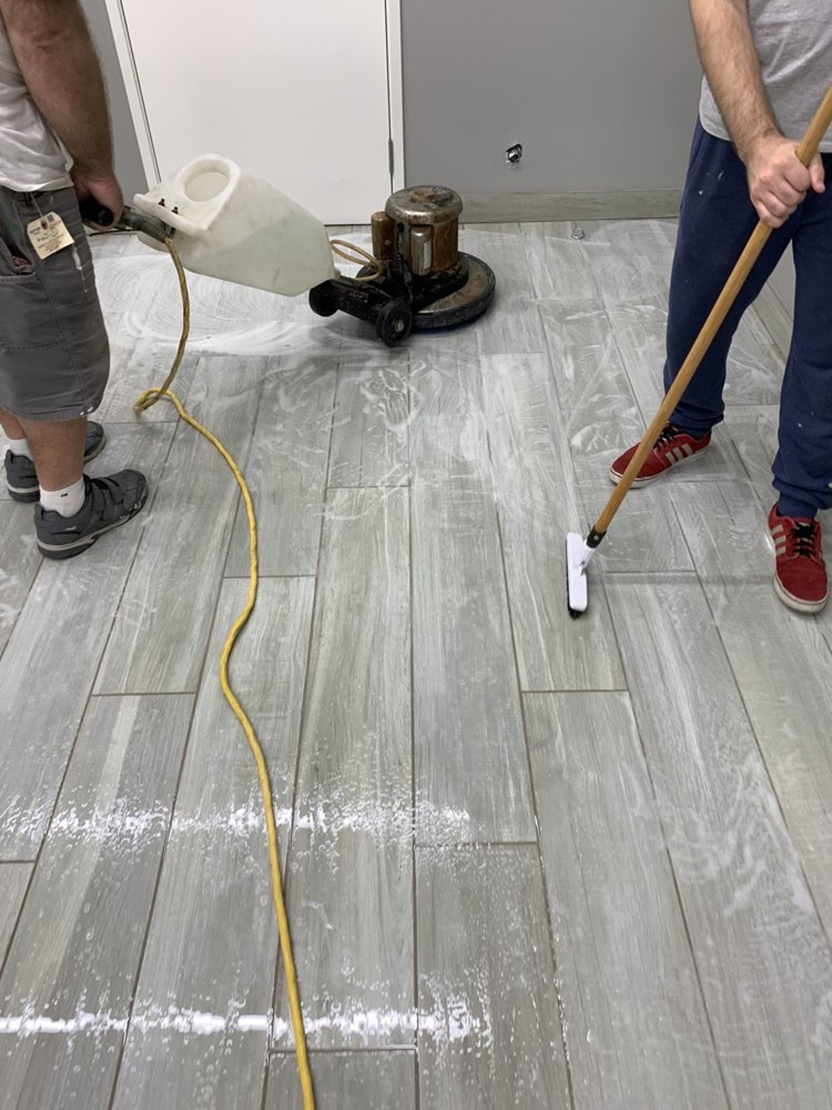 Floor scrubbing in progress