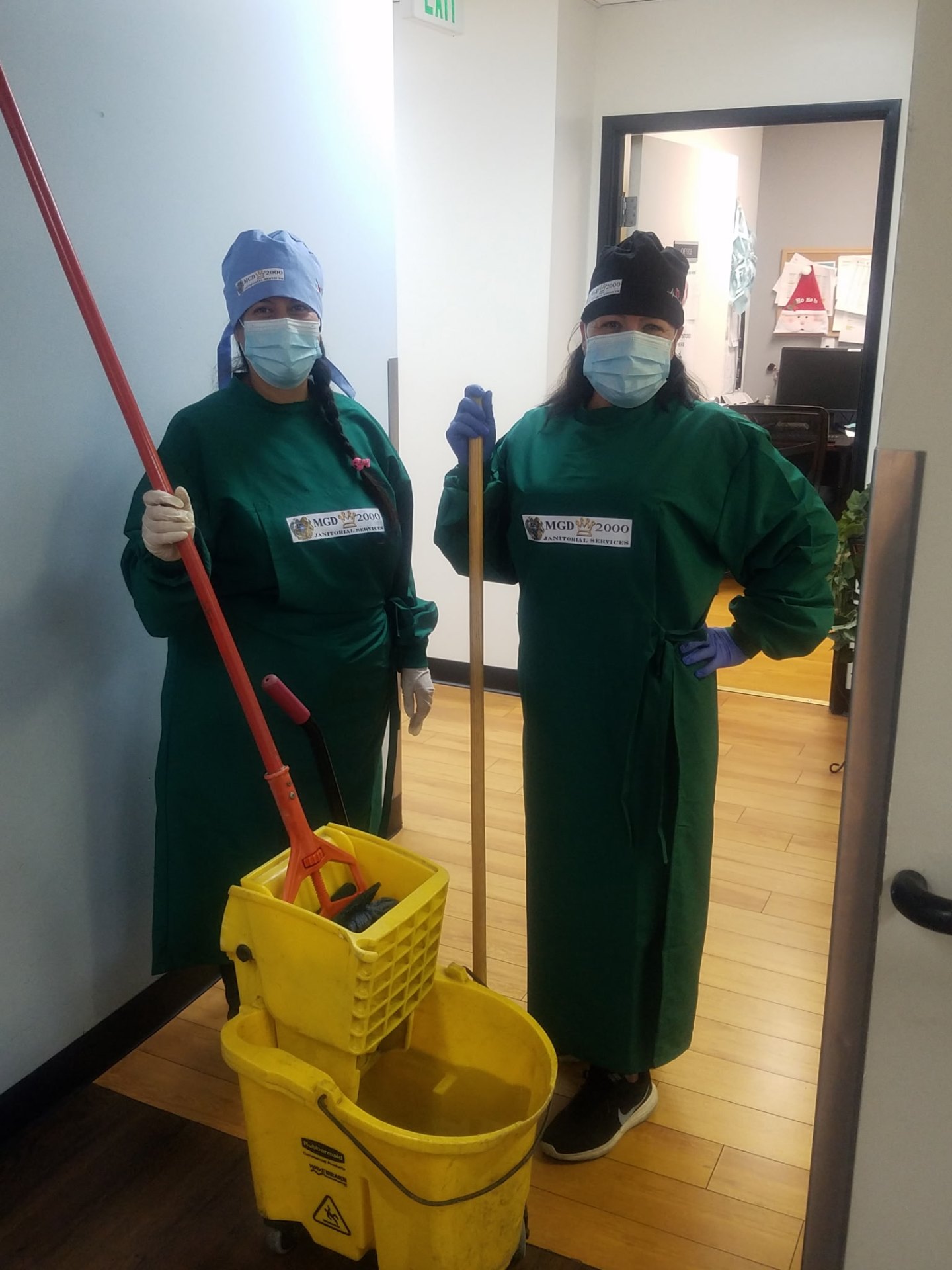 MGD technicians in PPE ready for a medical facility clean